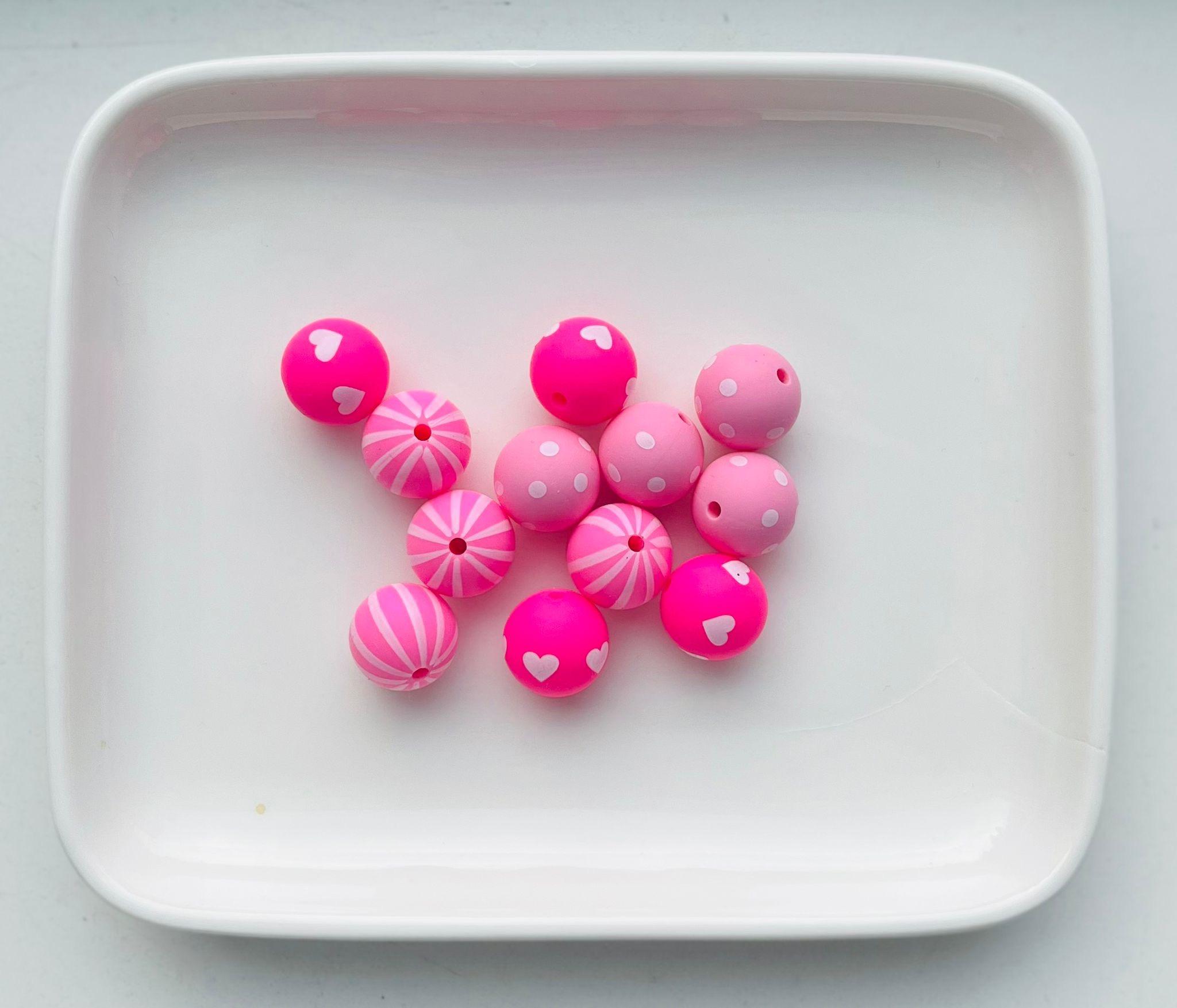Diverse rosa silikonperler